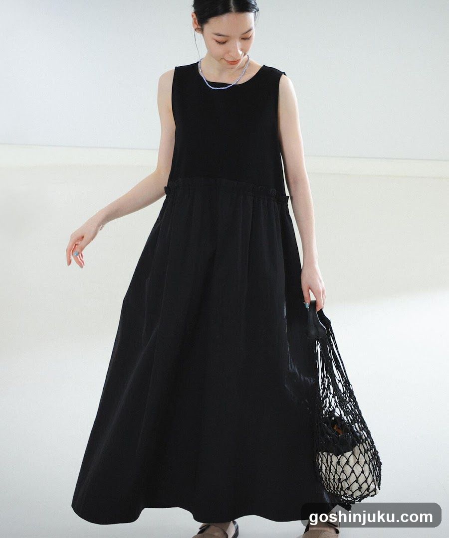 Woman in Black Dress with Mesh Bag