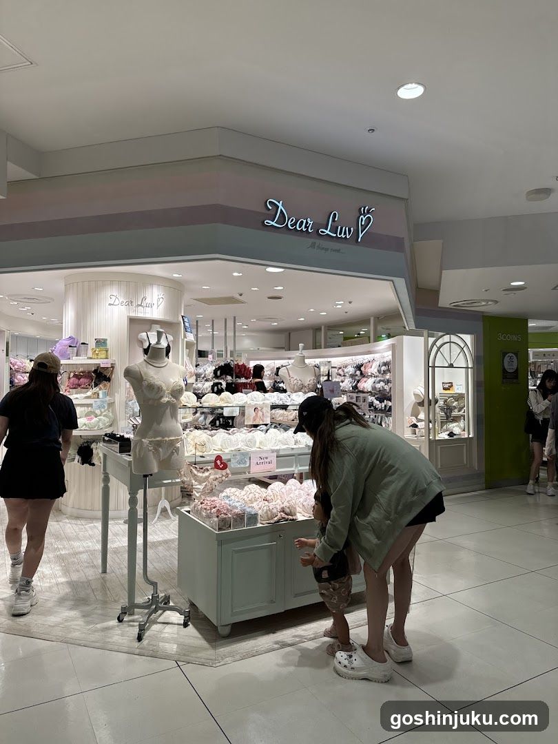 Interior of a lingerie store with customers browsing