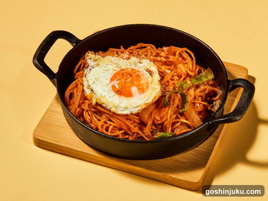 Spaghetti with Fried Egg in Cast Iron Skillet