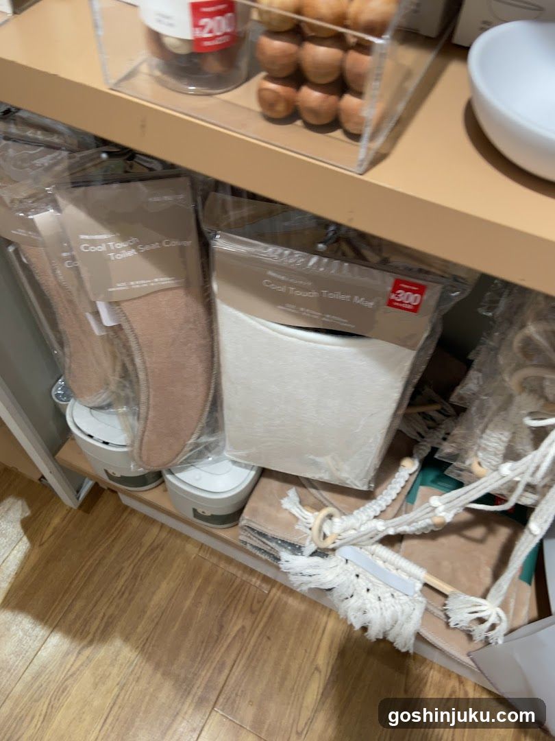 Toilet Seat Covers and Mats Display