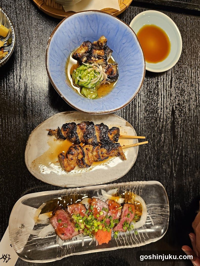 Japanese Table Setting with Grilled Skewers and Sashimi