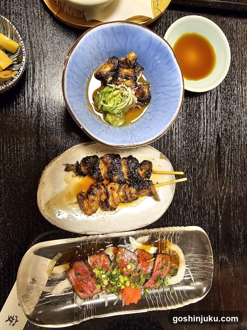 Japanese Table Setting with Grilled Skewers and Sashimi