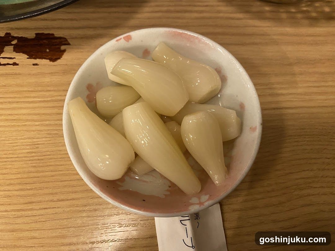 Bowl of pickled garlic cloves