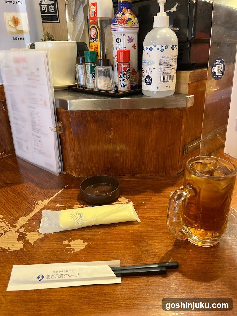 Dining Table with Condiments and Drink