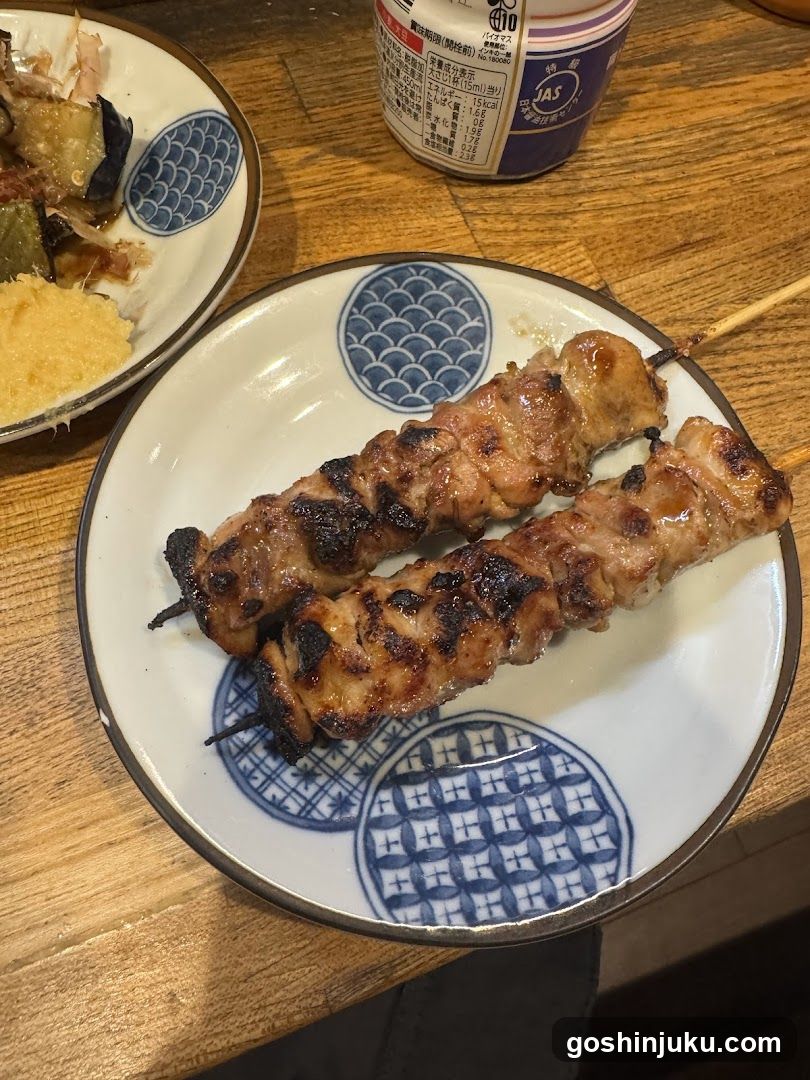 Grilled Meat Skewers on a Patterned Plate
