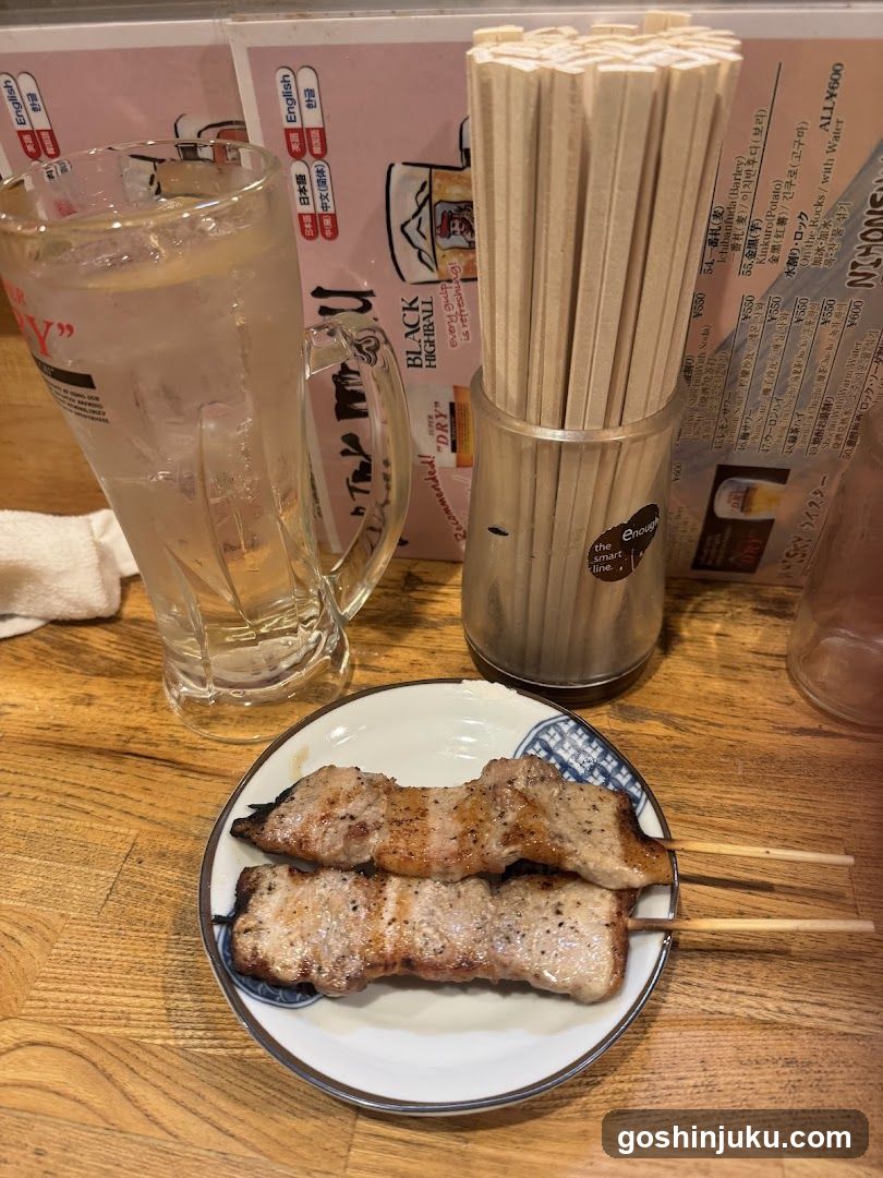 Grilled Skewers and Drink at Restaurant Table
