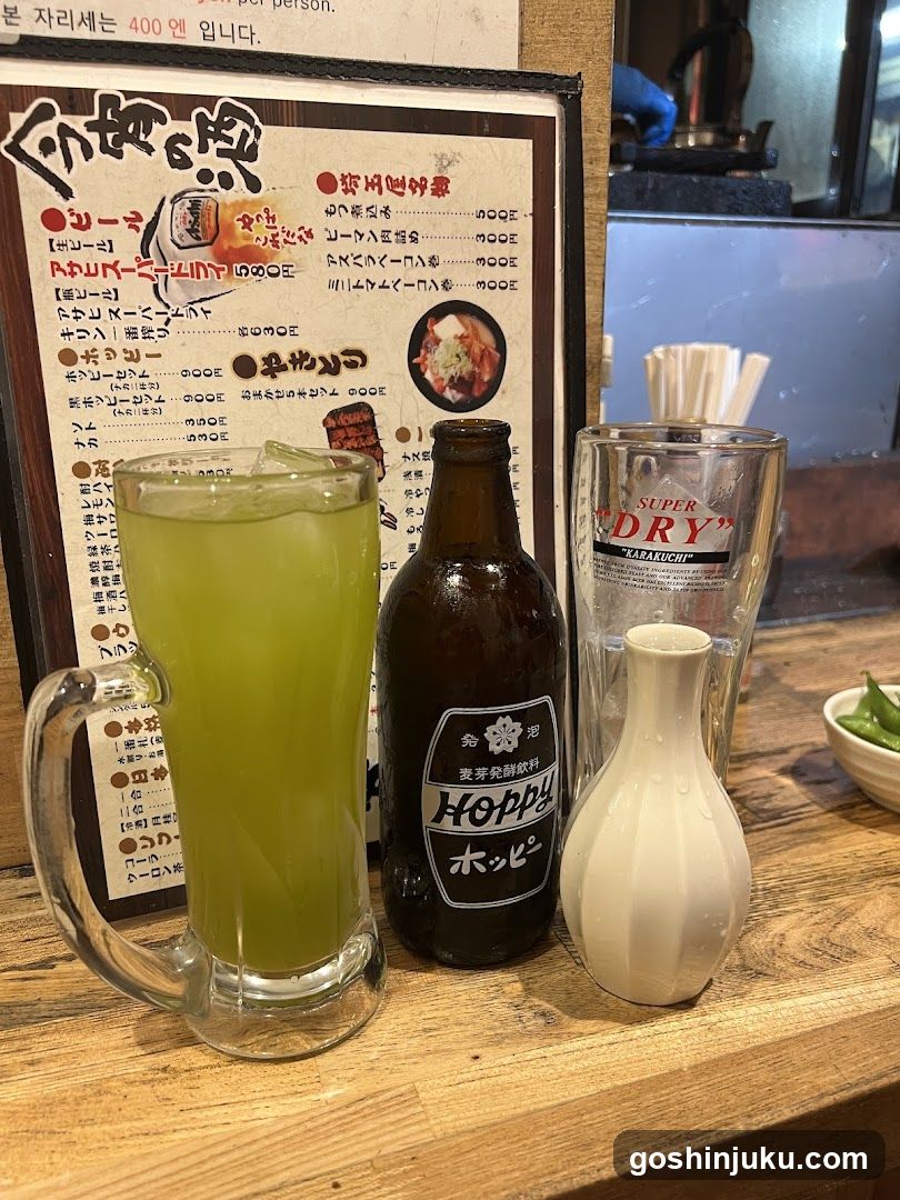 Beverage and condiment setup at a Japanese restaurant
