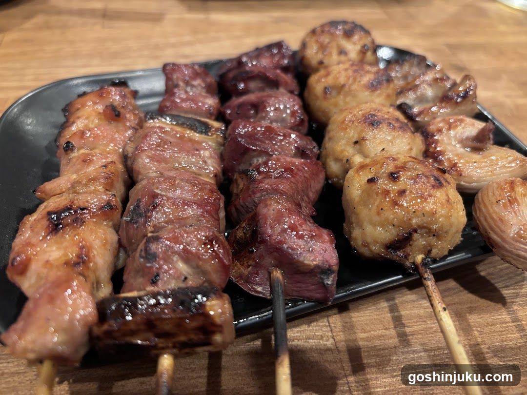 Grilled Skewers on Black Plate