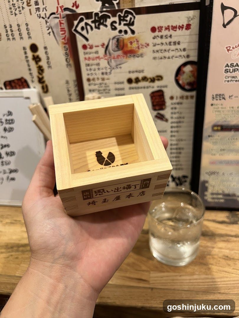 Wooden box held in hand at restaurant
