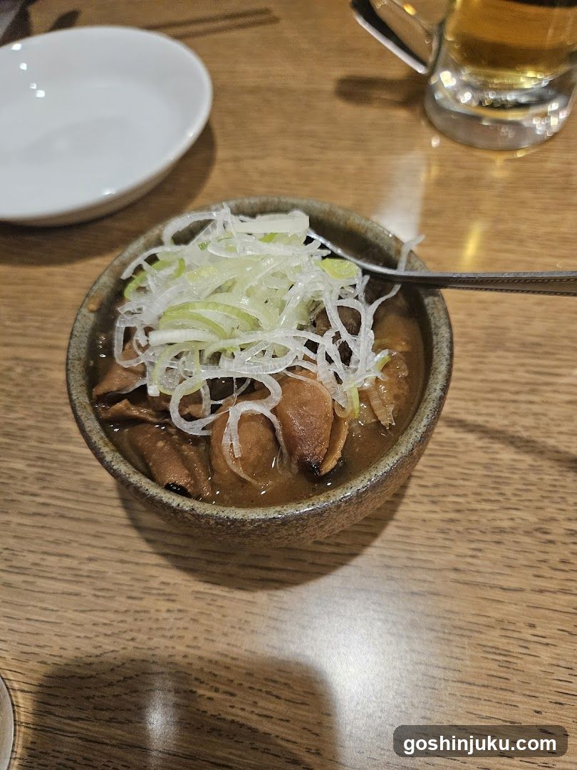 Bowl of stew with garnish