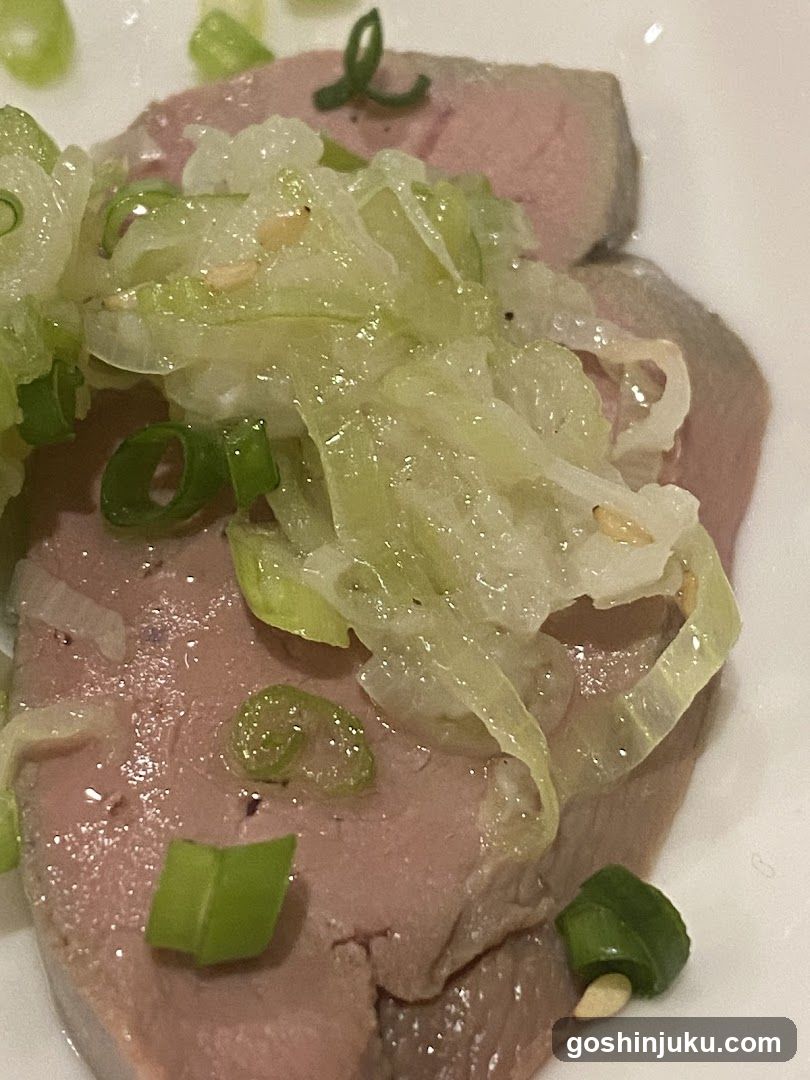 Sliced Meat with Cabbage Topping