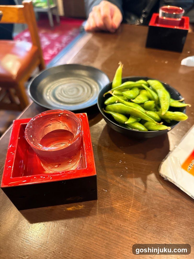 Edamame and Drink at Restaurant Table
