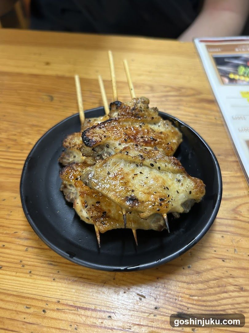 Grilled Skewers on Black Plate