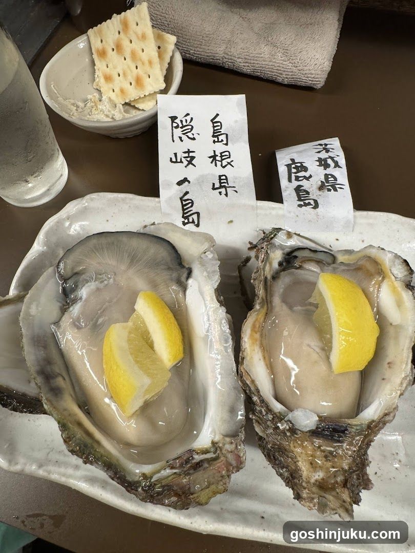 Oysters with lemon wedges and crackers