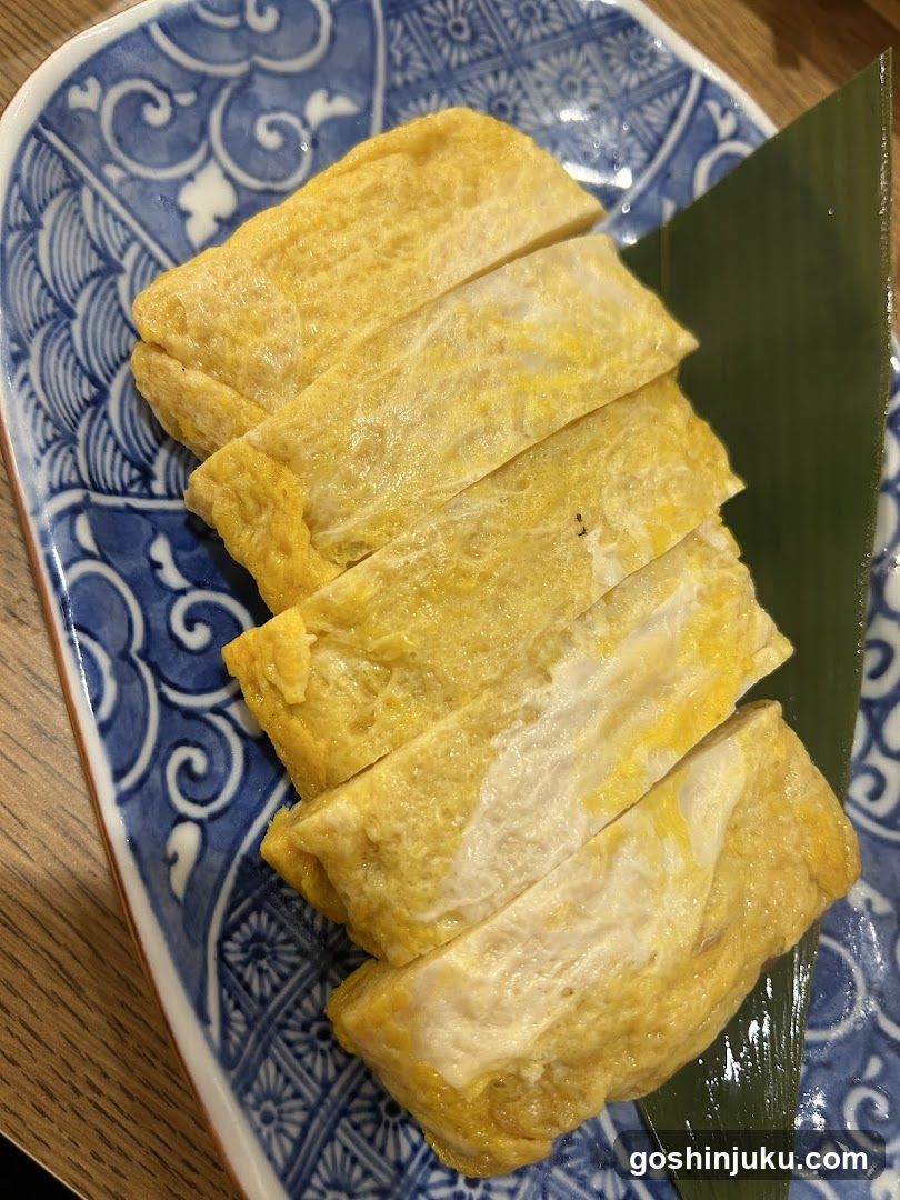 Sliced Omelette on Blue Patterned Plate
