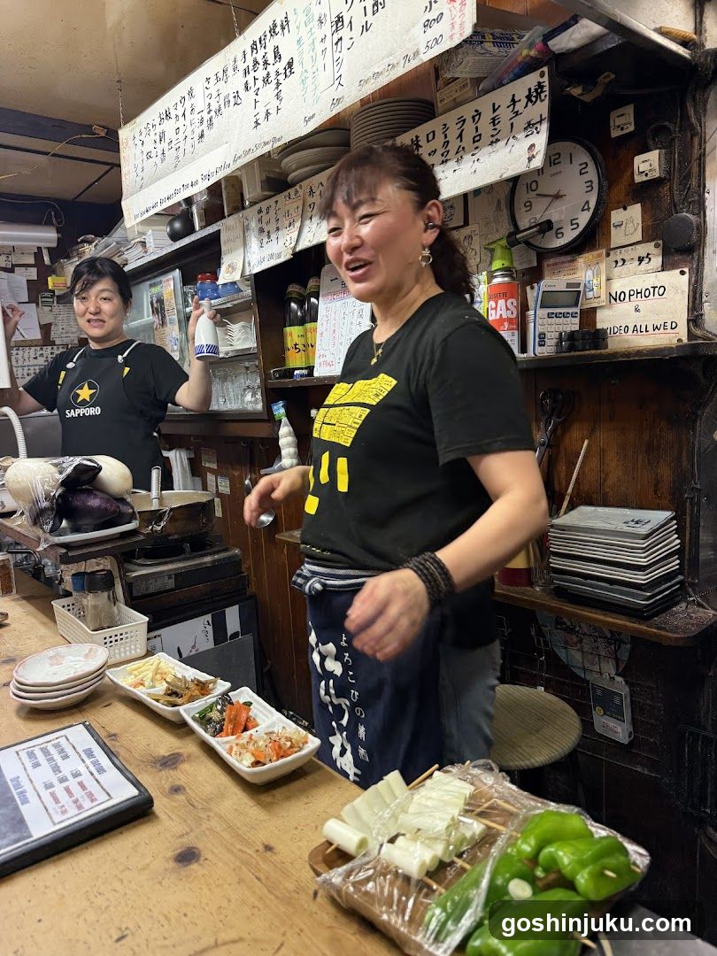 Restaurant Interior with Staff and Food Display