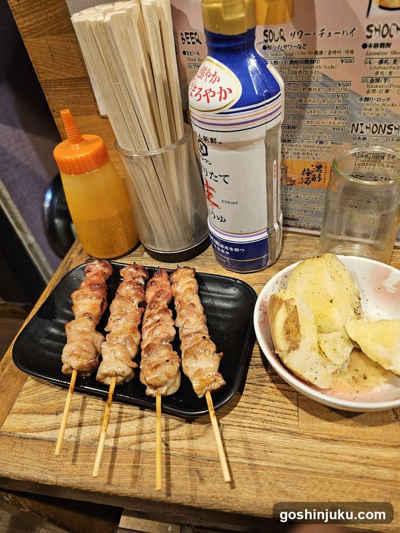Grilled Skewers and Sides at a Japanese Restaurant