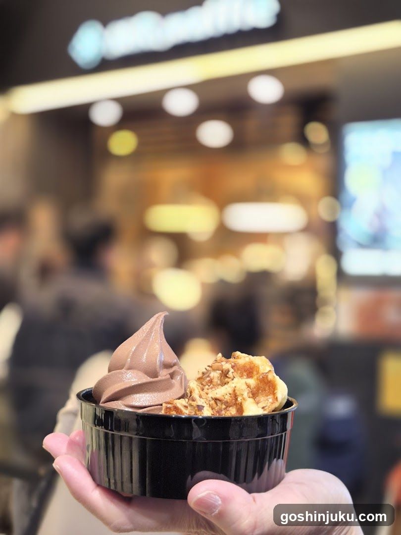 Handheld Dessert with Chocolate Ice Cream and Waffle Cone