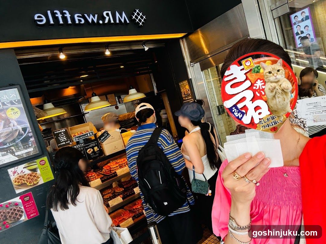 MR.Waffle storefront with customers and signage