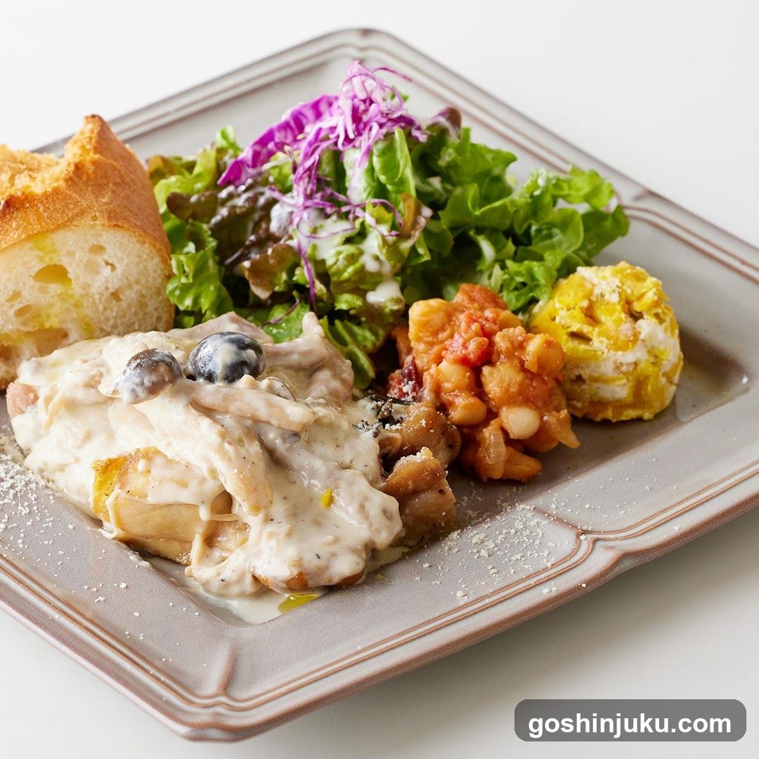 Plated Meal with Salad and Bread
