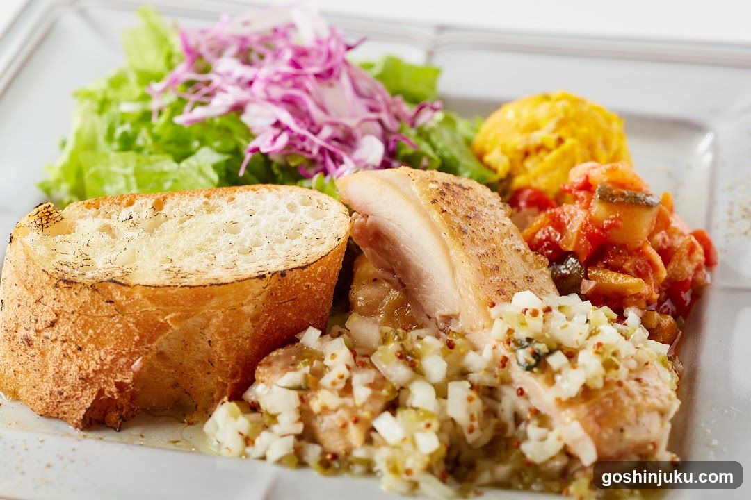 Plated Meal with Salad and Bread