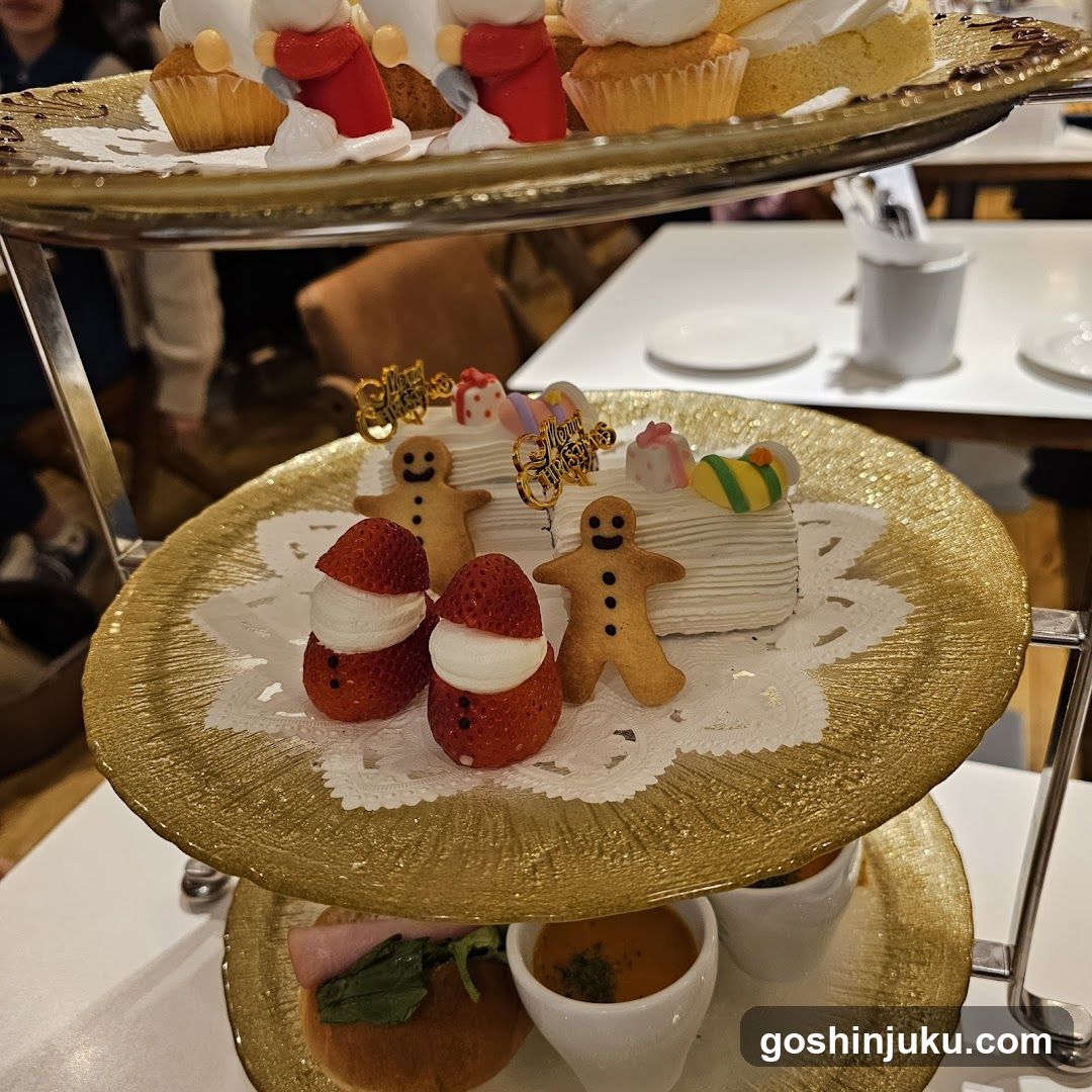 Three-tiered dessert stand with festive treats