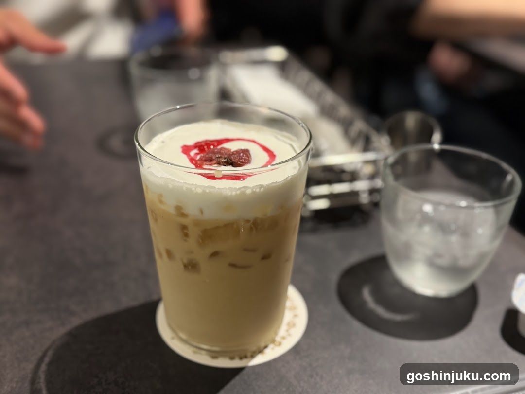 Iced Coffee with Cream and Raspberry Garnish