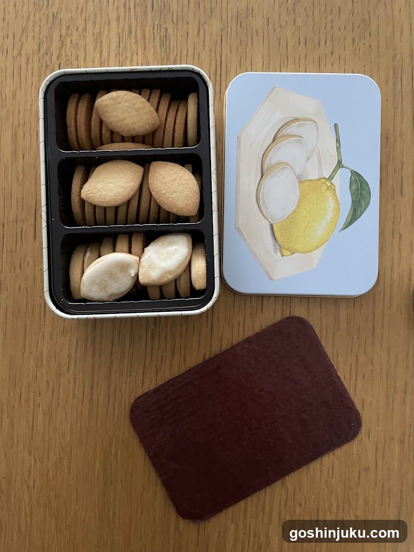 Lemon-themed biscuit tin on wooden table