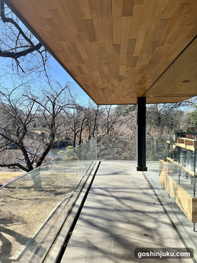 Modern Glass Pavilion with Wooden Ceiling