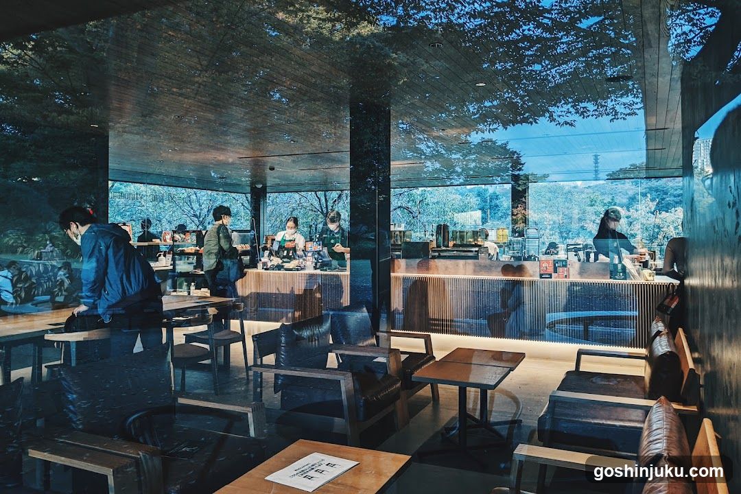 Interior of a modern coffee shop with outdoor seating area