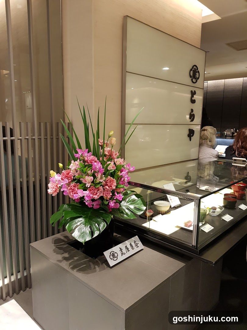 Dessert Display Counter with Floral Arrangement