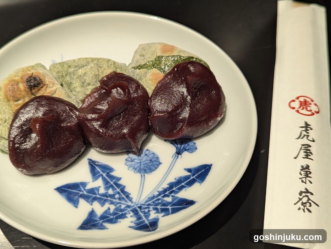 Dish of red bean paste sweets on a plate with chopsticks wrapper