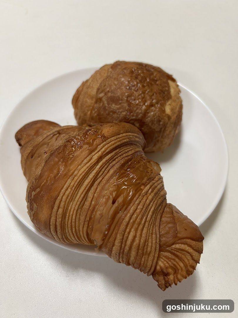 Croissant and Pastry on Plate