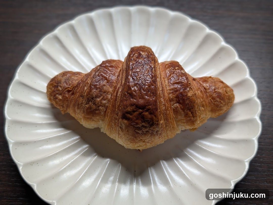 Croissant on a white plate