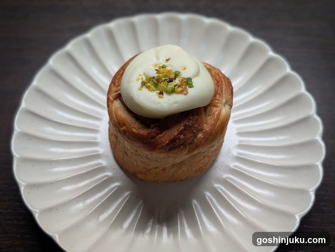 Pastry with Cream and Pistachio Topping
