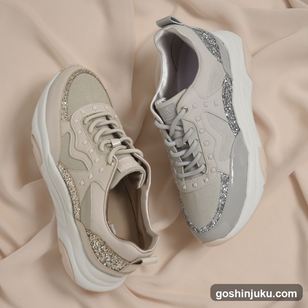 Glitter Sneakers on Fabric Background