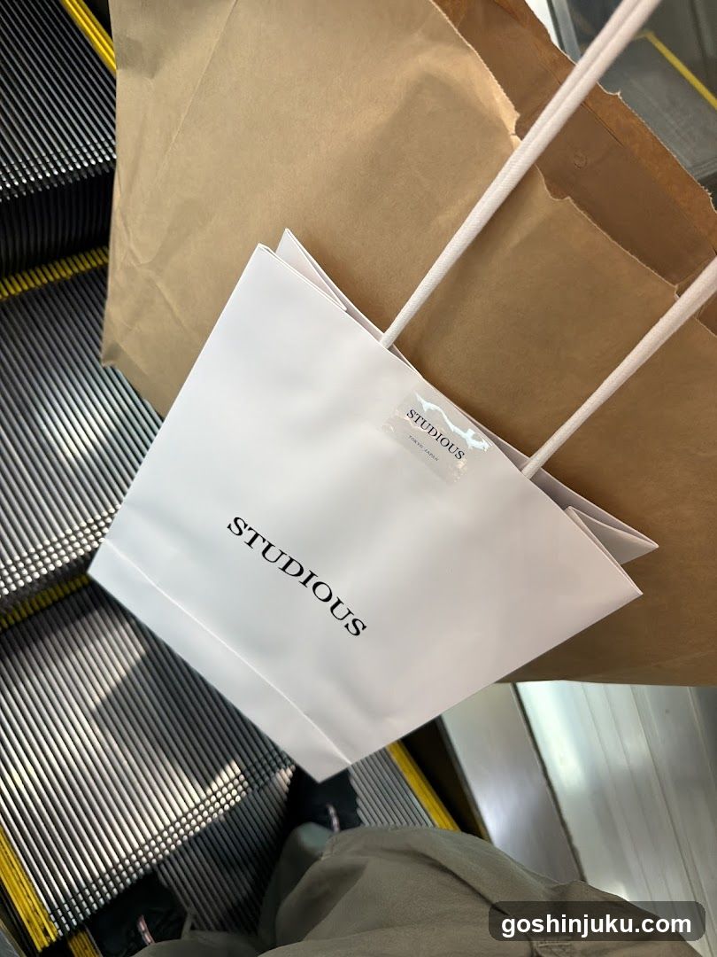 Shopping bags on escalator