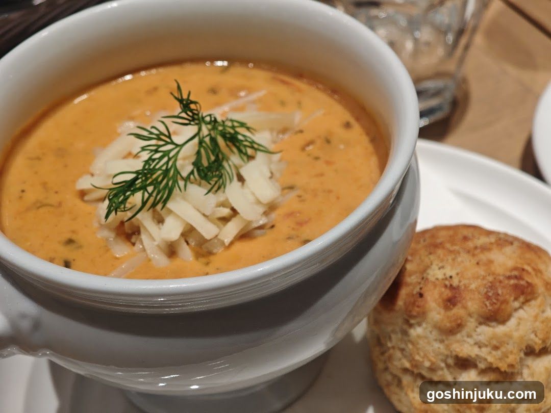 Creamy Soup with Garnish and Biscuit