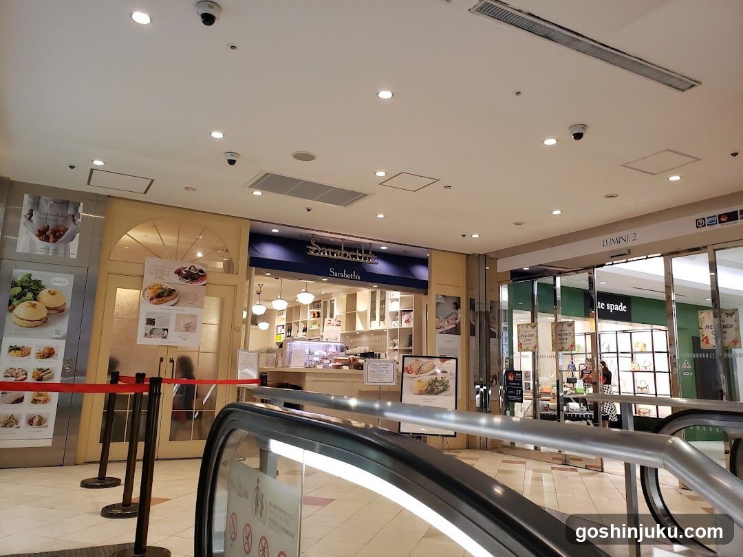 Shopping Mall Interior with Food Court and Storefronts
