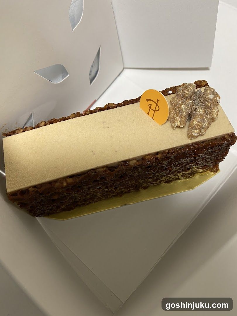 Cake Slice with Honeycomb and Walnut Decoration