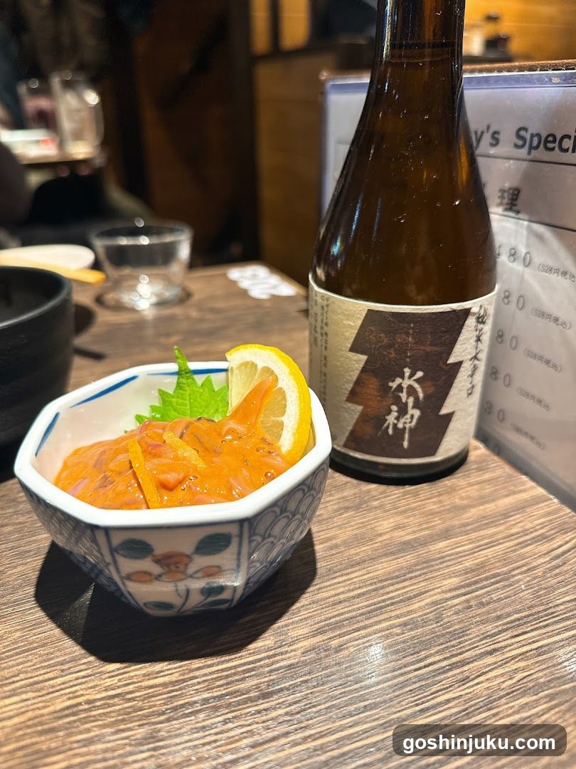 Sashimi and Sake on a Wooden Table
