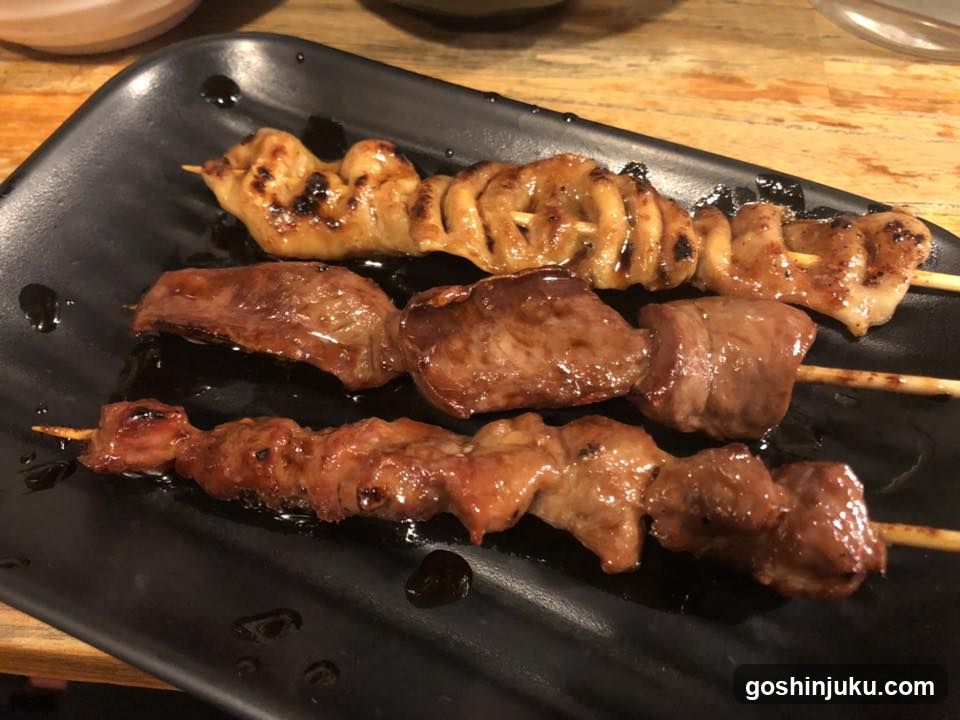 Grilled Skewers on Black Plate