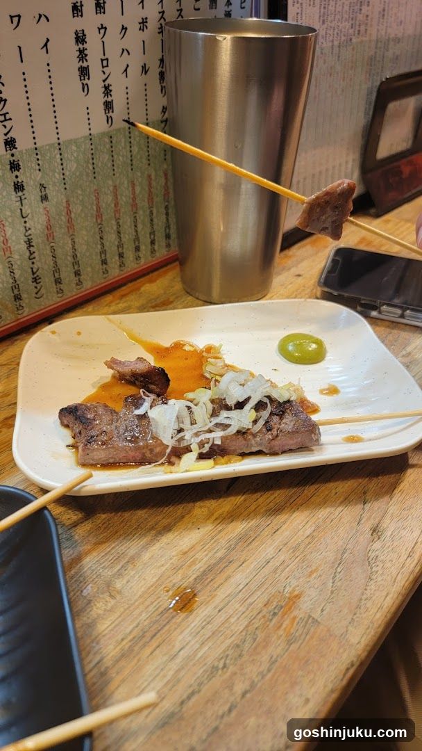 Yakitori and Drink at Japanese Restaurant