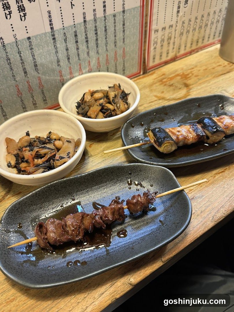 Grilled Skewers and Side Dishes at a Japanese Restaurant