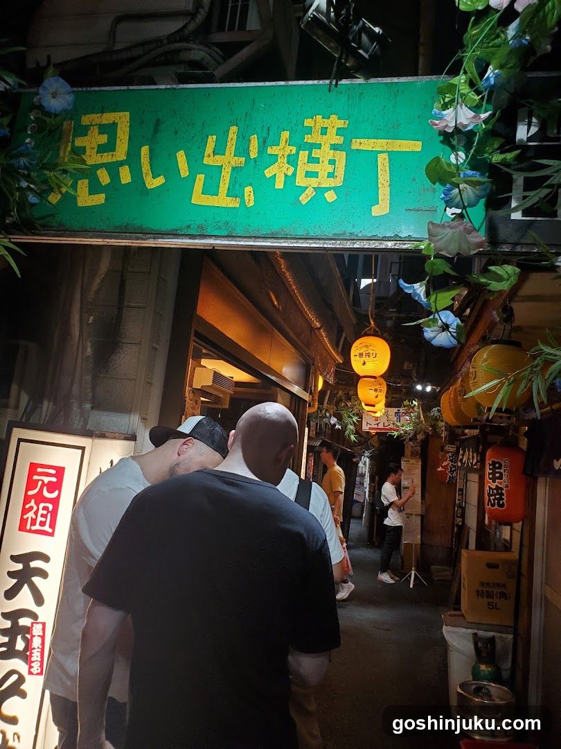 Night Street Scene with People and Signage