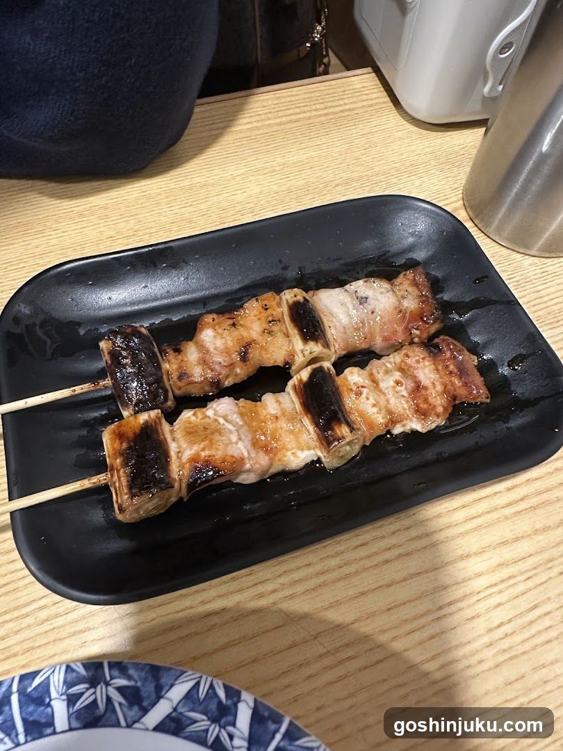 Grilled Skewers on Black Plate