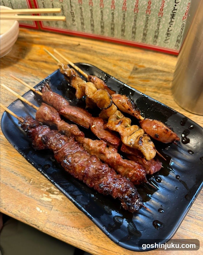 Grilled Skewers on Black Plate