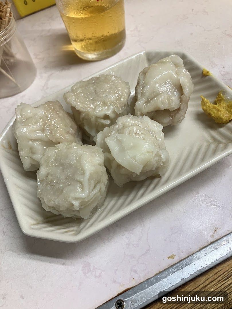 Dumplings on a plate with drink