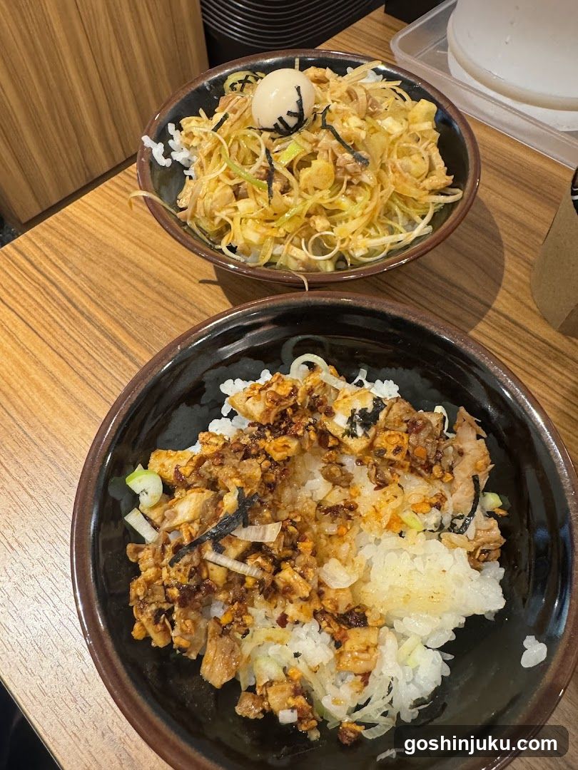 Bowl of food with rice and toppings