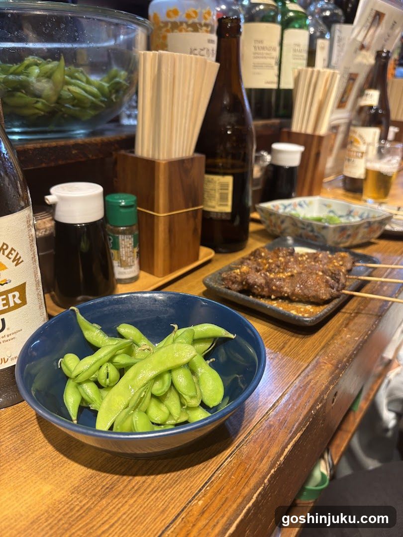 Edamame and Skewers at a Bar